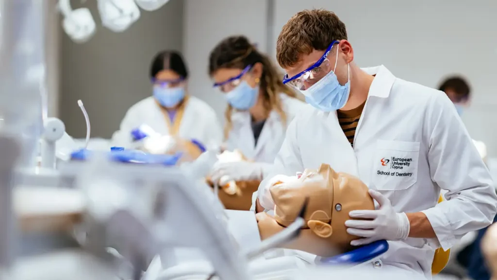 dental student studying odontology books
